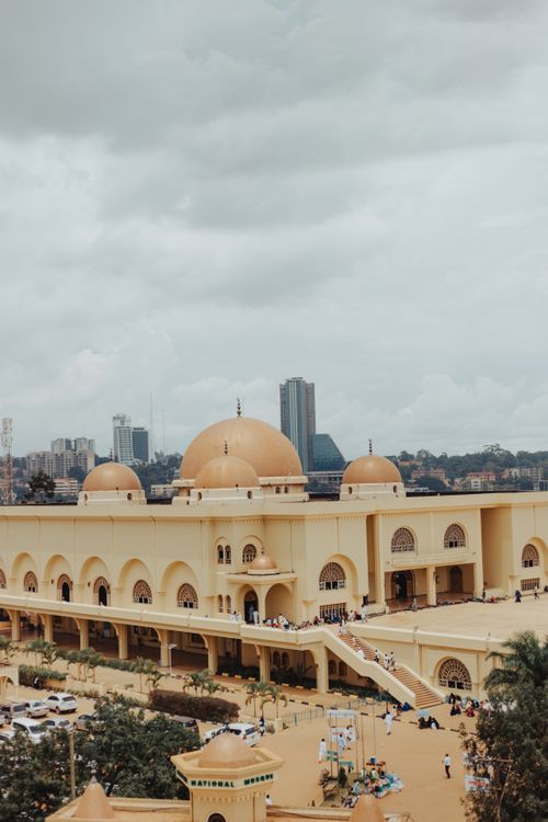 Free Aerial view of a grand mosque with a backdrop of Kampala city skyline, Uganda. Stock Photo