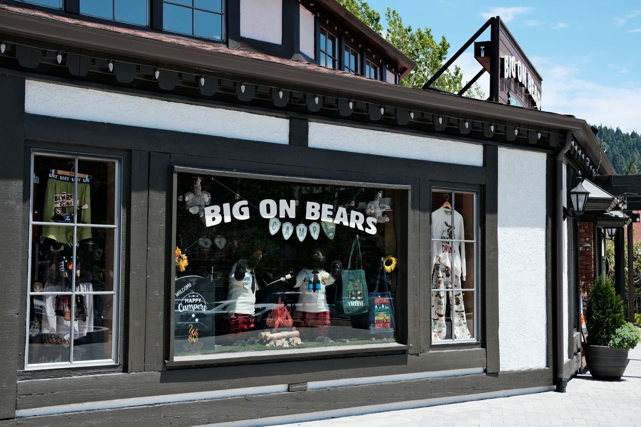 exterior view of a quaint toy store featuring bear themed decorations