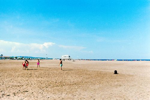 Free People enjoying beach games on a sunny day in Gruissan, Occitanie, France. Stock Photo