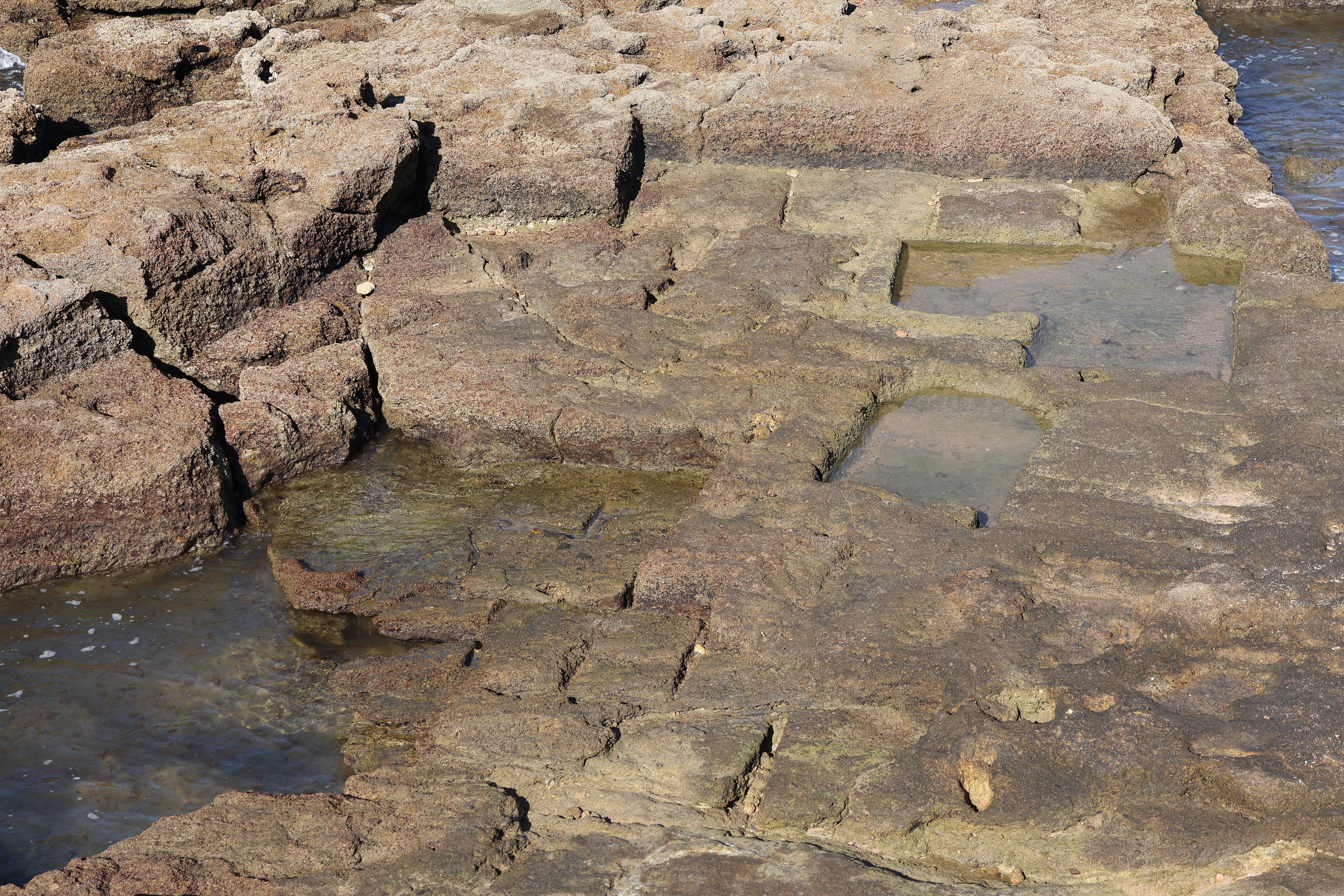 Cala Pada Rock Pools at Low Tide