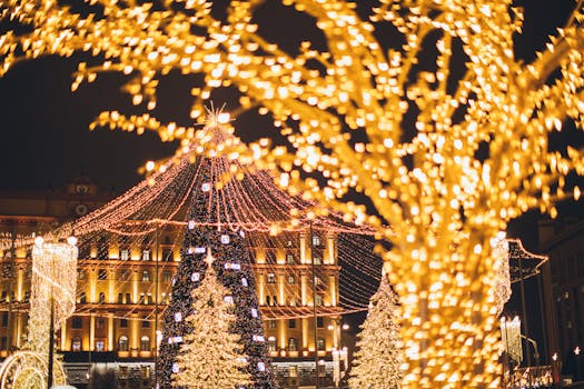 Vibrant display of Christmas lights and decorations at night creating a festive atmosphere.