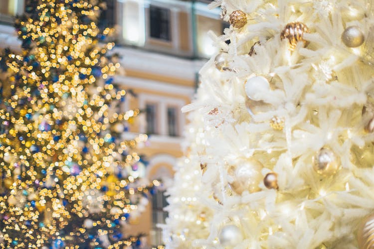 White And Gold Christmas Tree With Yellow String Lights