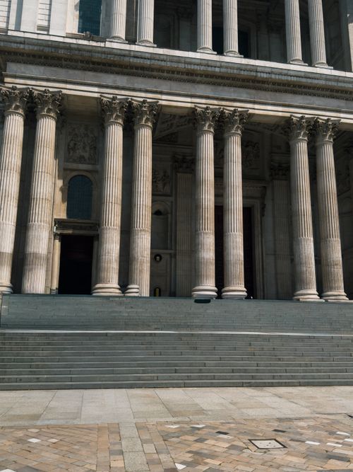Free Elegant facade of St. Paul's Cathedral showcasing grand classical columns in soft daylight. Stock Photo