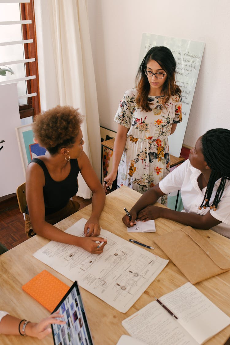 Photo Of Women Having A Meeting