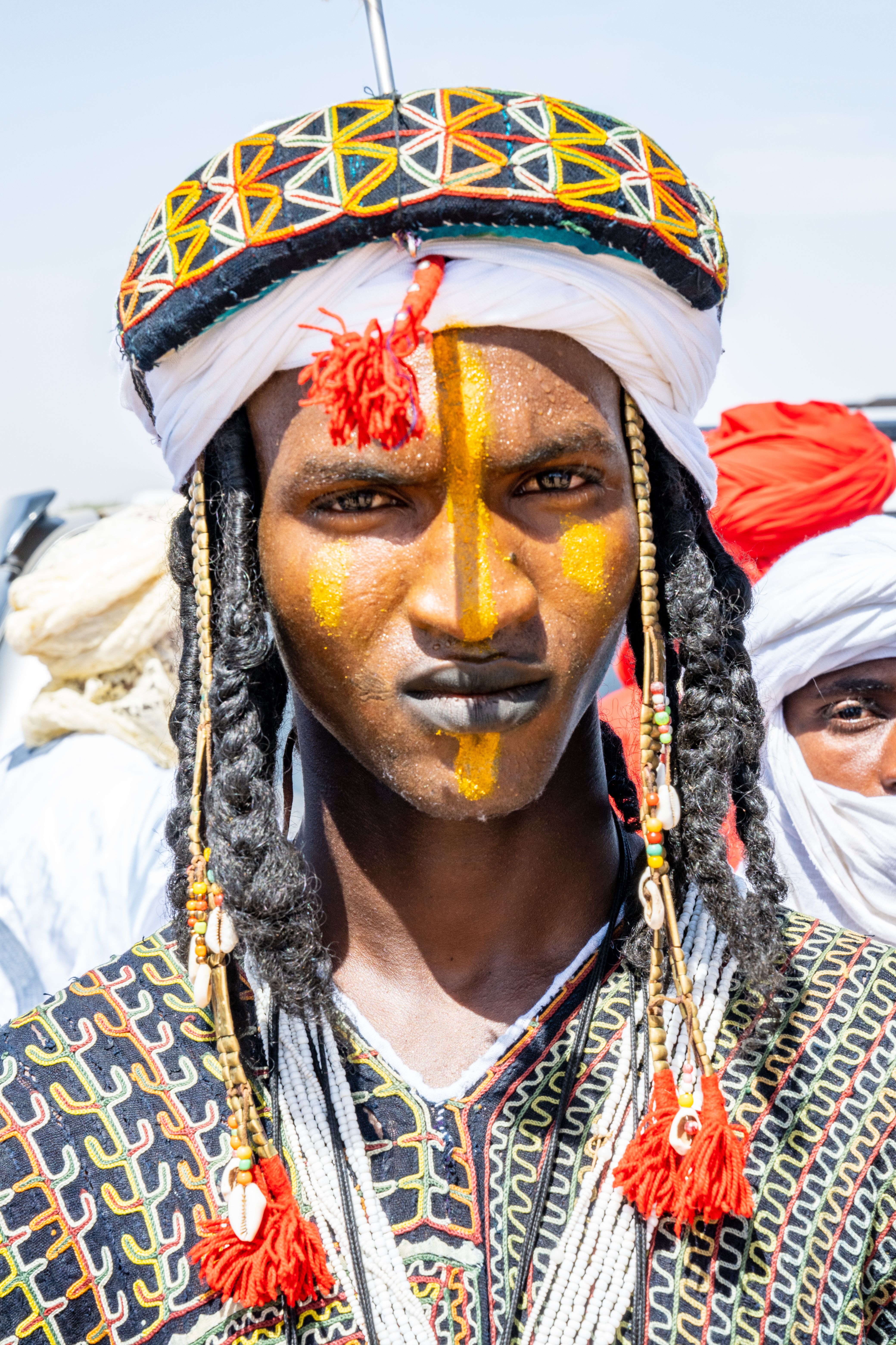 Portrait of a Wodaabe man in traditional attire at the Gerewol festival, Niger.