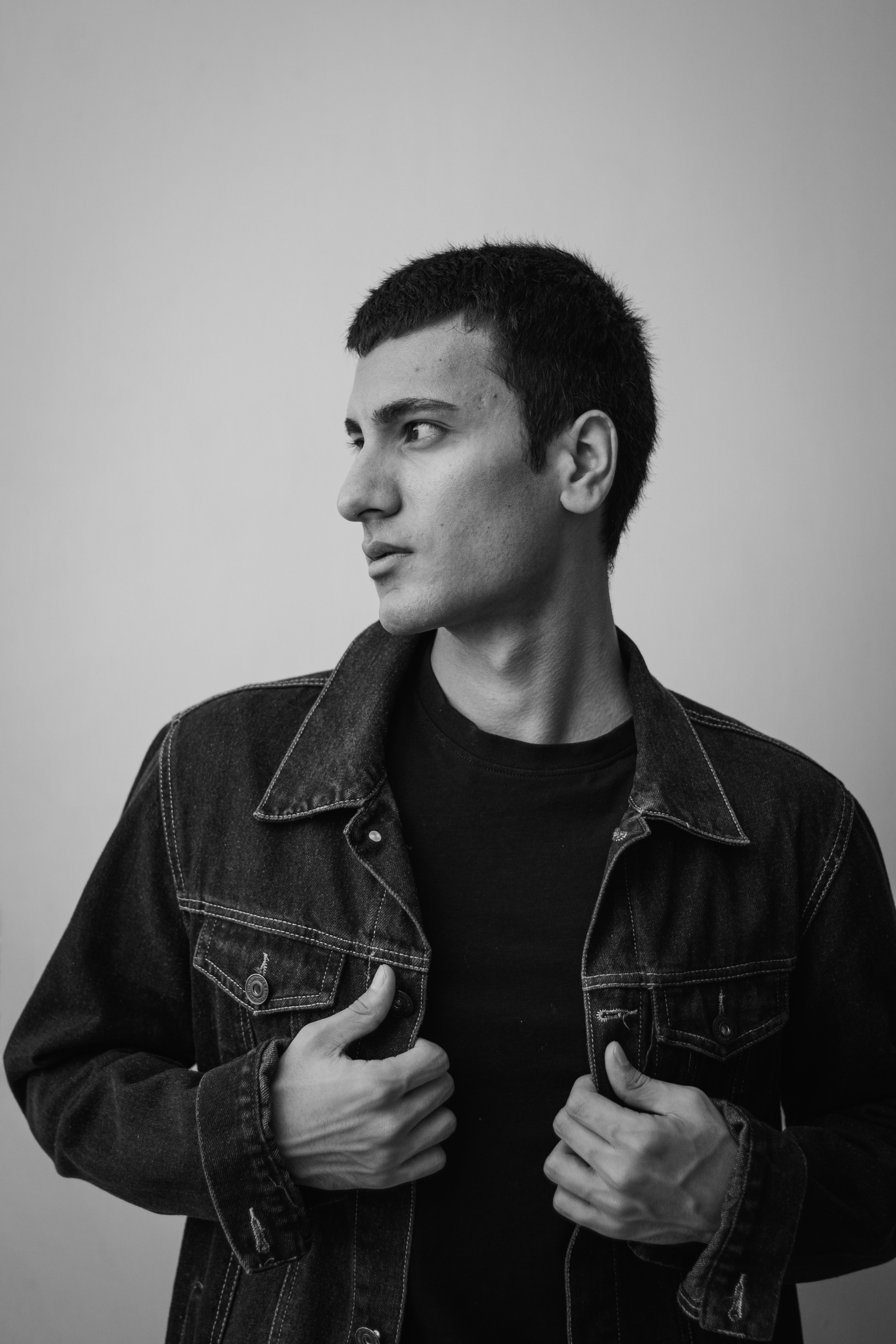 Monochrome portrait of VØID looking off camera
