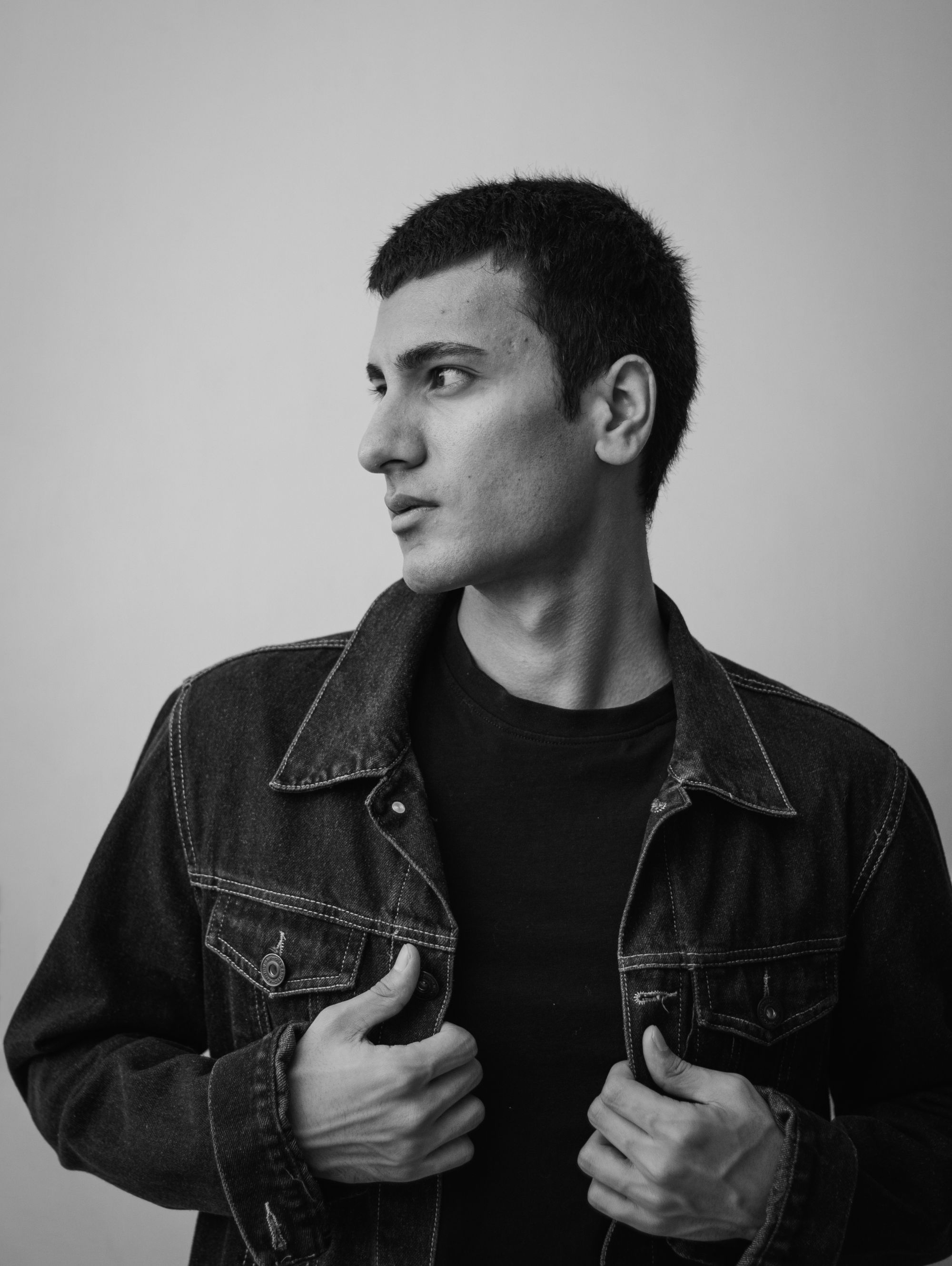 Monochrome portrait of VØID looking off camera