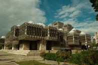 Stunning view of the National Library in Pristina, a blend of modern and brutalist architecture.