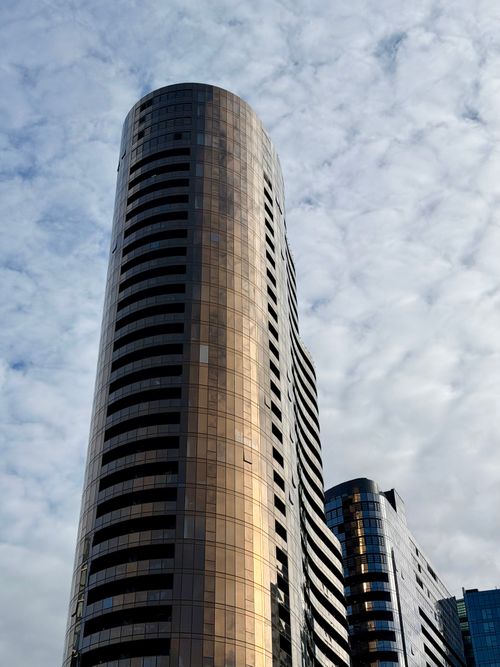 Free Tall modern skyscraper with glass facade in Box Hill, Victoria, Australia. Stock Photo