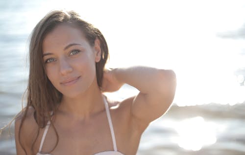 Free Woman in White Bikini Top Smiling Stock Photo