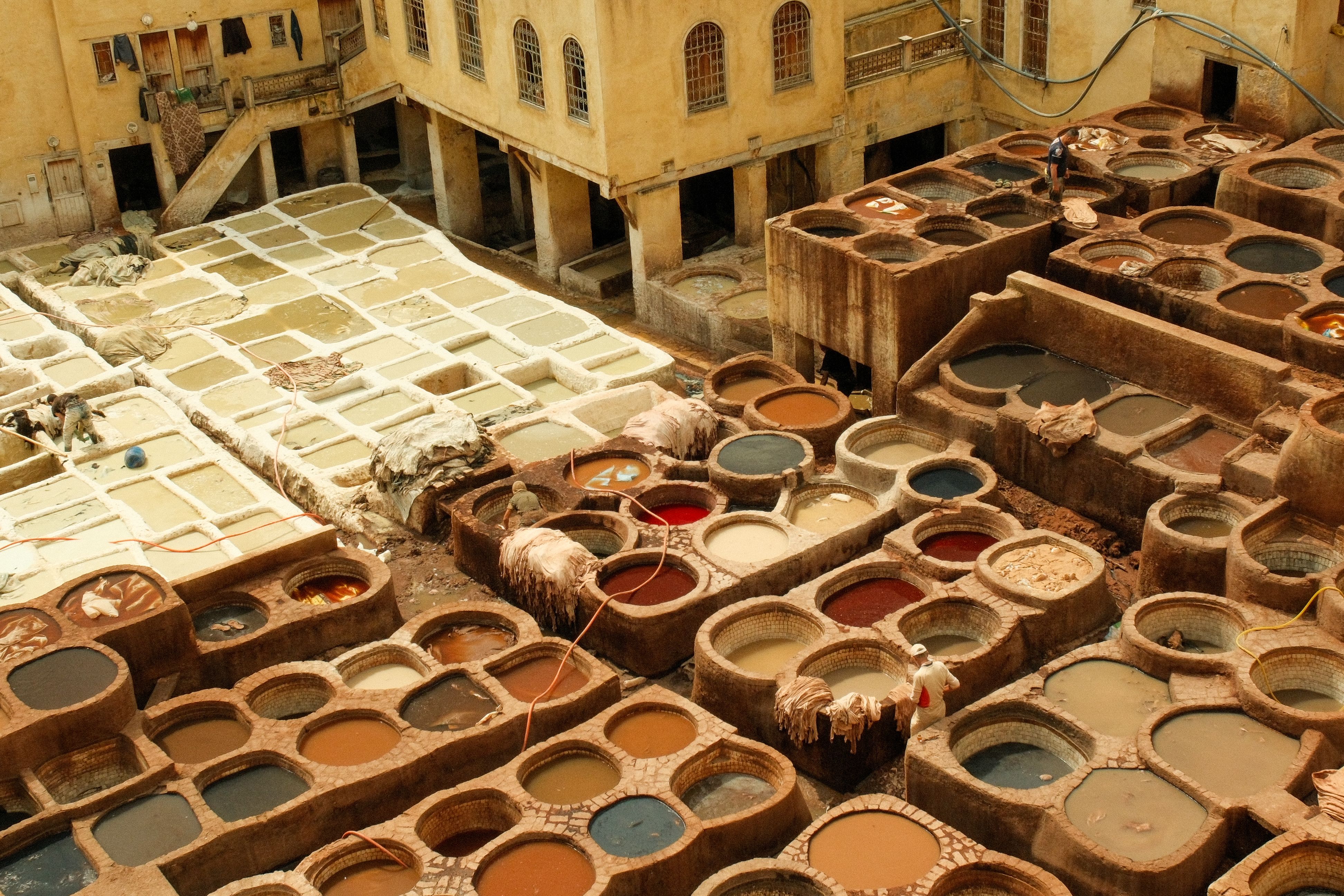 Aerial view of colorful traditional leather tanneries in Fes, Morocco.