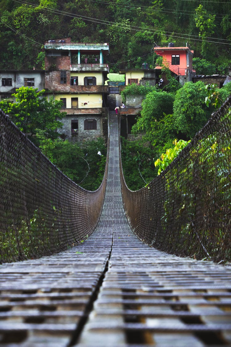 Brown Wooden Suspension Bridge Over River