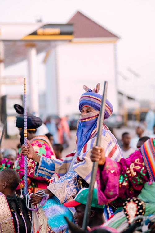 Free Vibrant traditional African parade with colorful attire and cultural celebration outdoors. Stock Photo