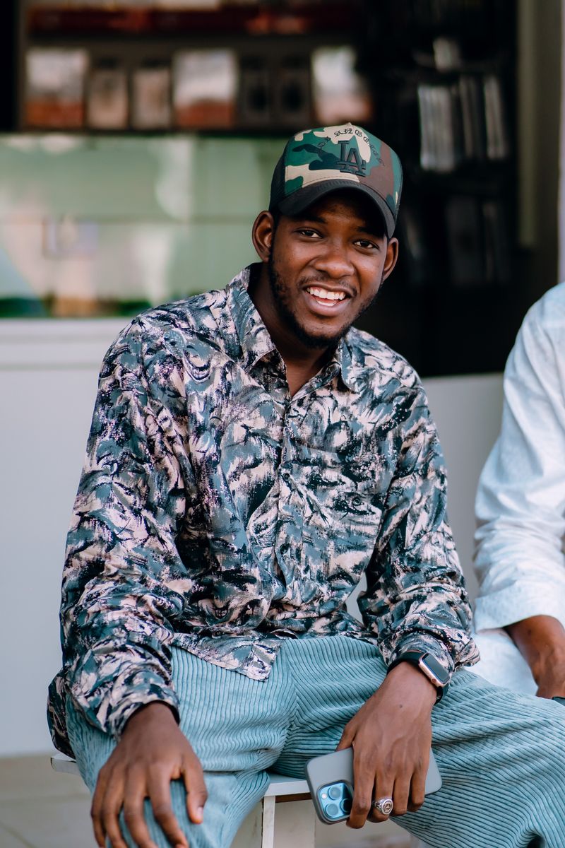 Portrait of a smiling man outdoors, photo by bobest Imagery on Pexels
