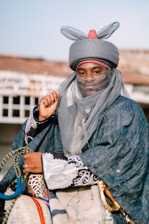 Free Portrait of a person in traditional attire outdoors, showcasing cultural heritage and elegance. Stock Photo