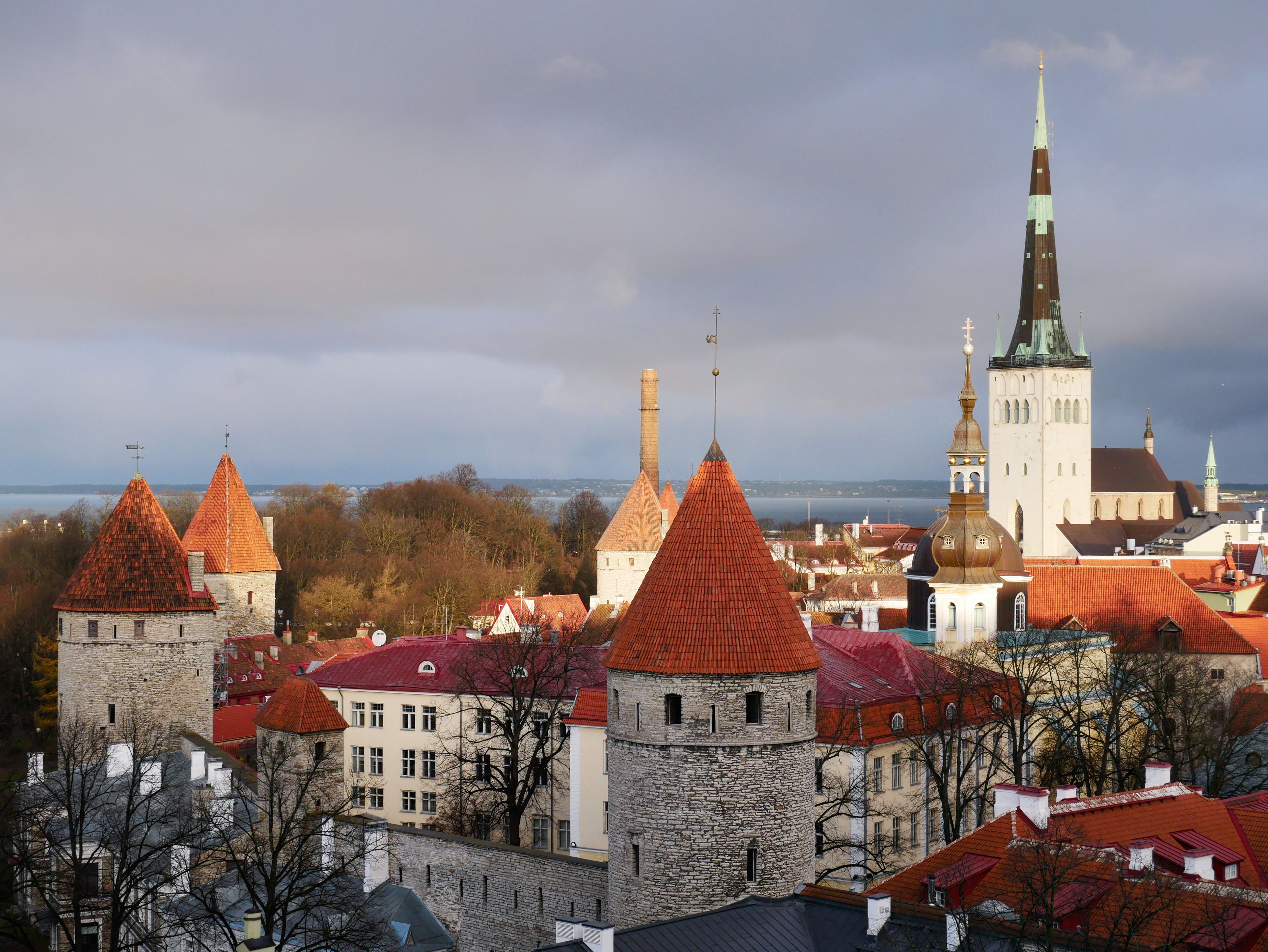 Tallinn's town wall towers and St. Olaf's spire seen from above