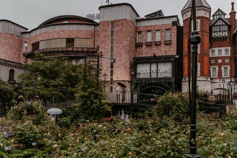 Red brick architecture and rose garden of Shiroi Koibito Park in Sapporo