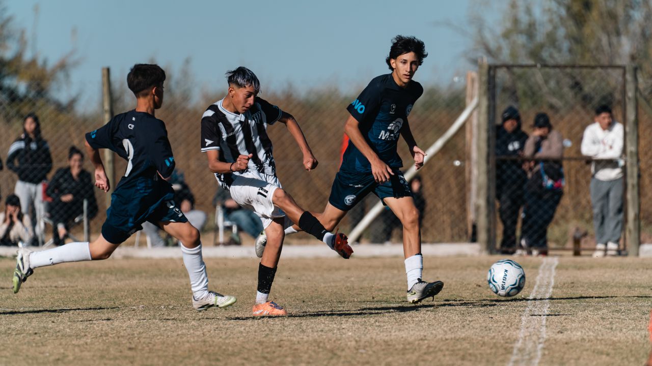 intense moment from a youth soccer match with players in motion on a g