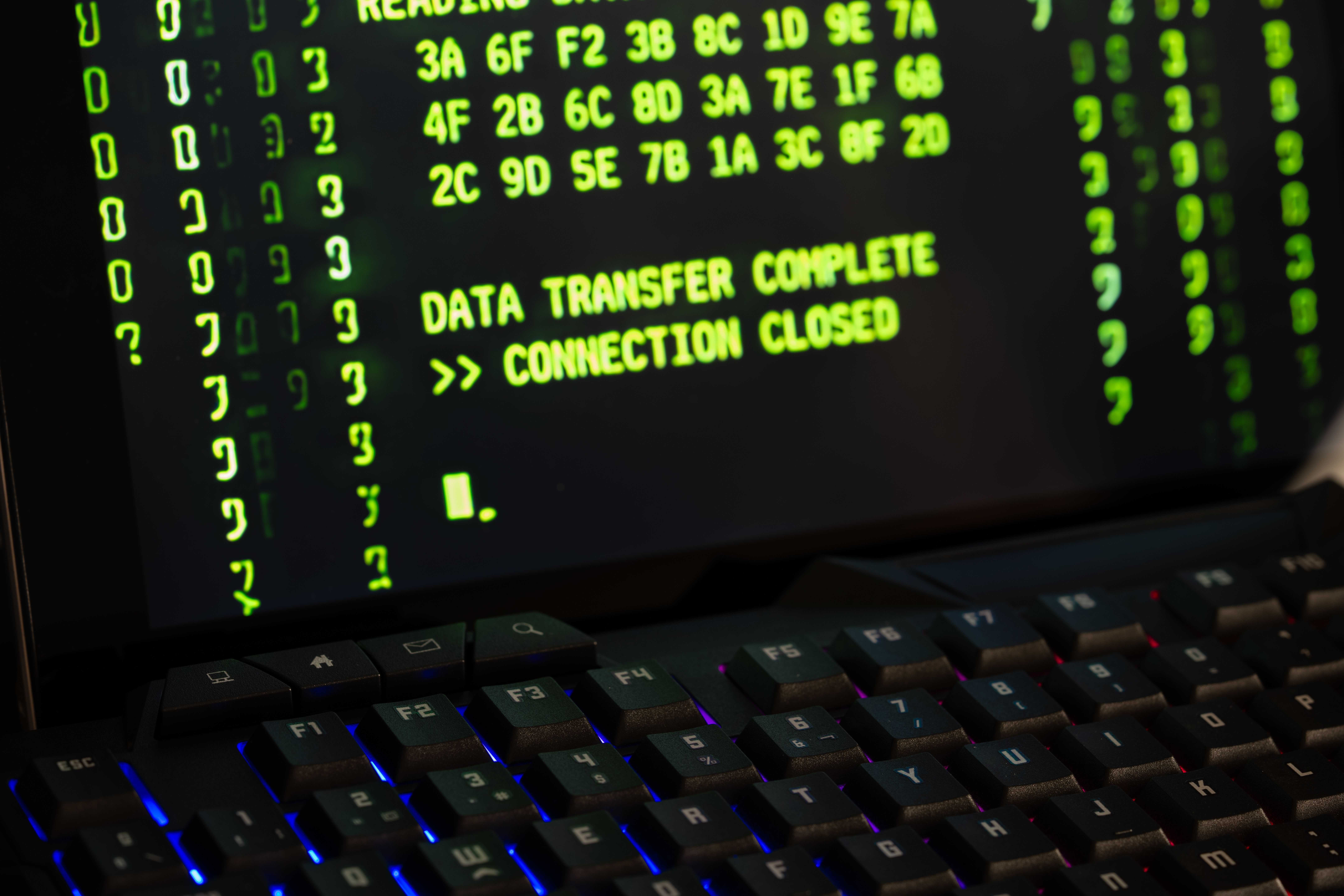 Close-Up of Data Transfer Screen with Keyboard · Free Stock Photo