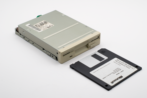 Computer Diskette Drive Vintage Computer with Floppy Disk Inserted · Free Stock Photo