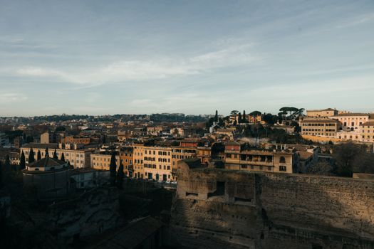 A stunning cityscape of Rome, Italy, captured at sunset, highlighting historic architecture.