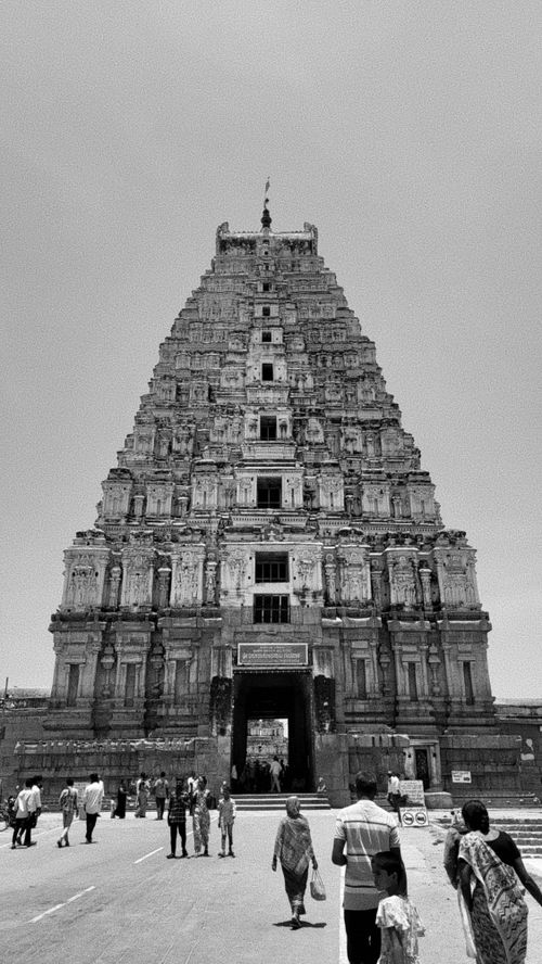 Free A stunning view of the ancient Virupaksha Temple in Hampi, showcasing its grand architecture. Stock Photo