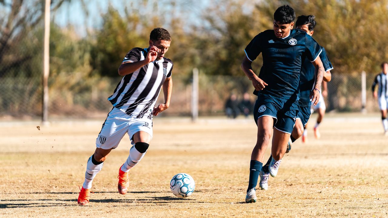 action packed soccer game with players in motion on an outdoor field