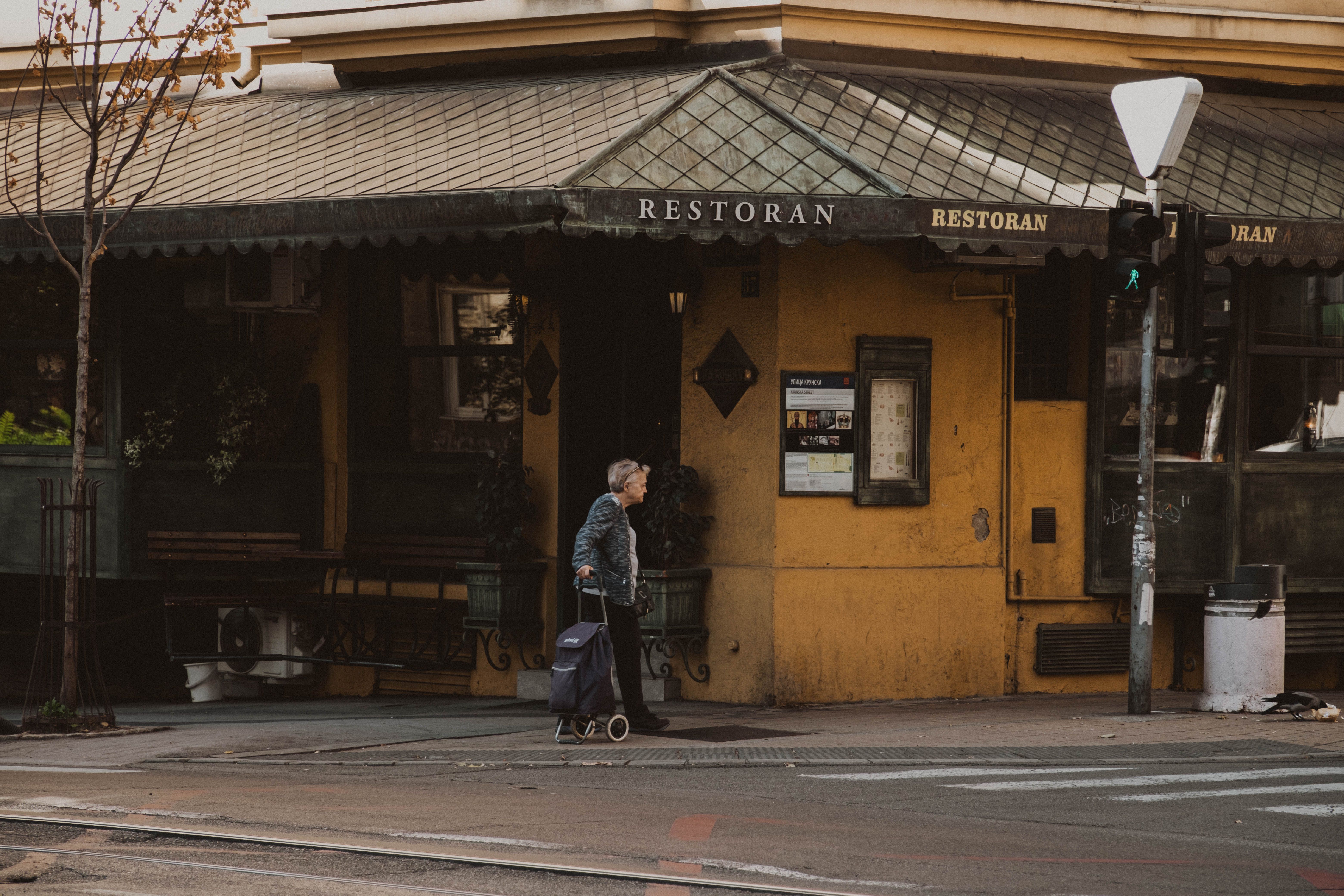 Lively street scene in Belgrade's old town, Serbia, suggesting the need for preparedness and emergency contacts while exploring.