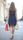 woman walking away