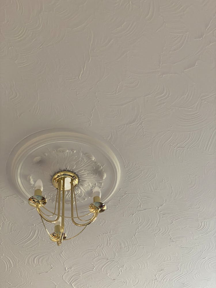 Golden Chandelier On White Vintage Ceiling