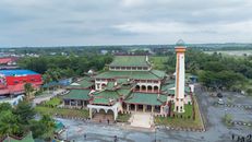 Aerial view of the Rantau Panjang mosque with traditional architecture in Kelantan, Malaysia.