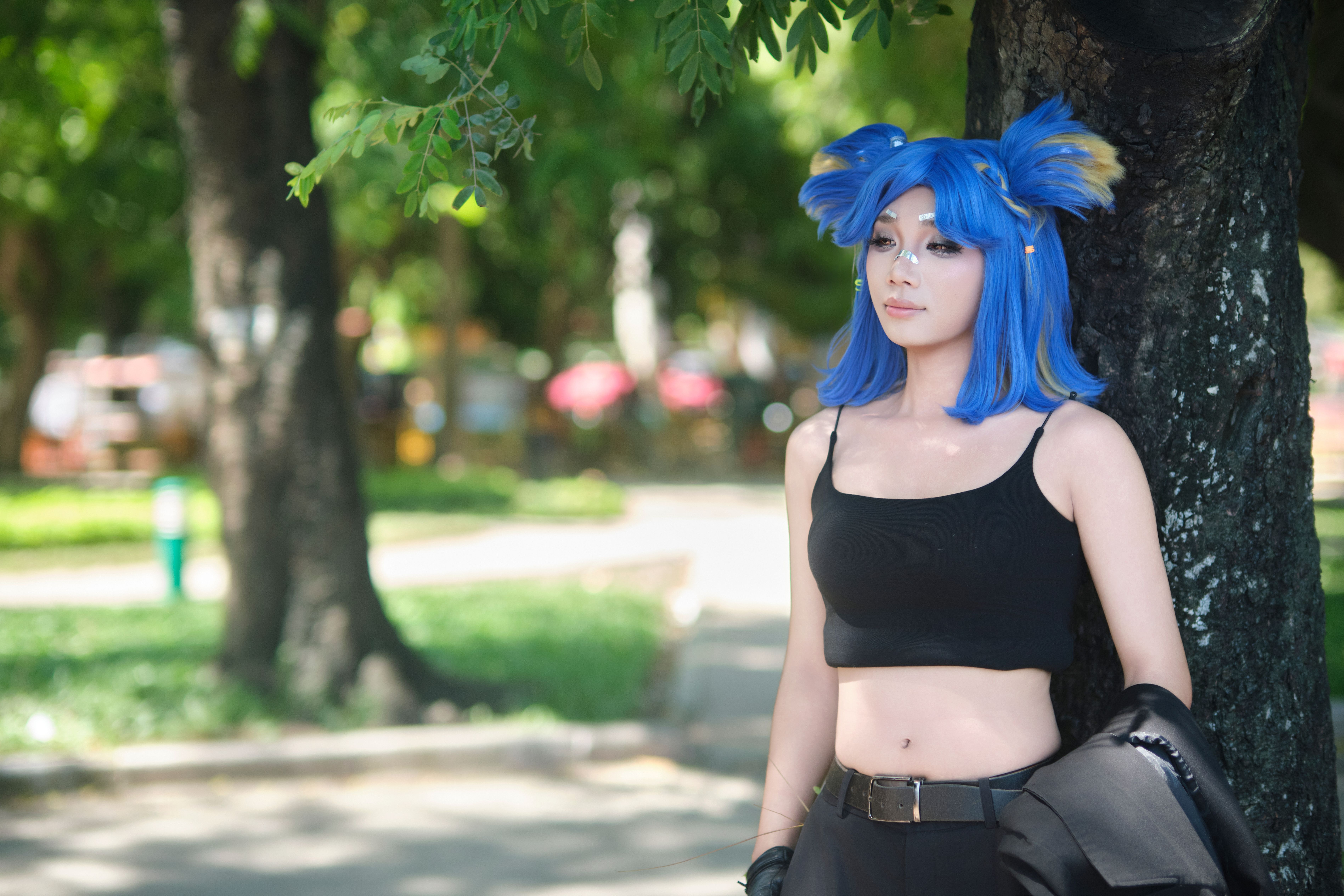 Vibrant Cosplay in Lush Park Setting