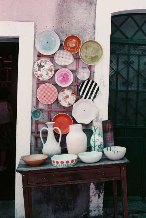 Free Vibrant ceramics artfully arranged in Lisbon, showcasing diverse patterns and colors. Stock Photo