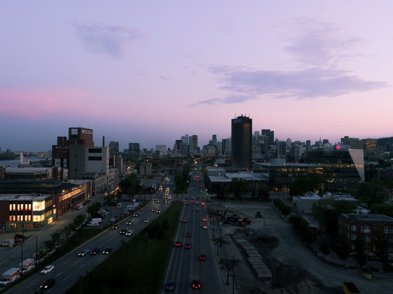 a stunning view of montreal s skyline at sunset featuring busy urban s