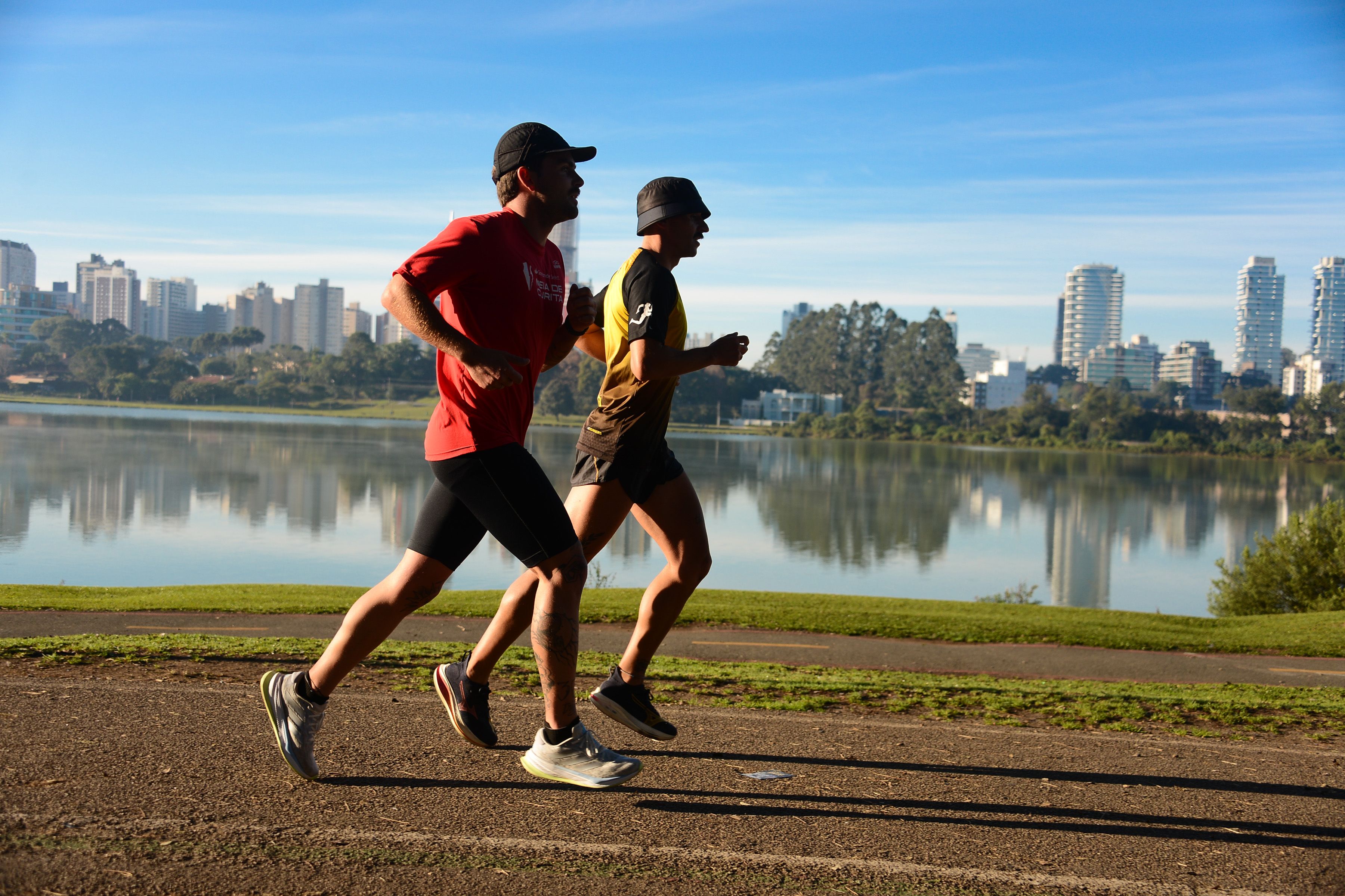 Joggers Running by Lake in Paraná, Brazil