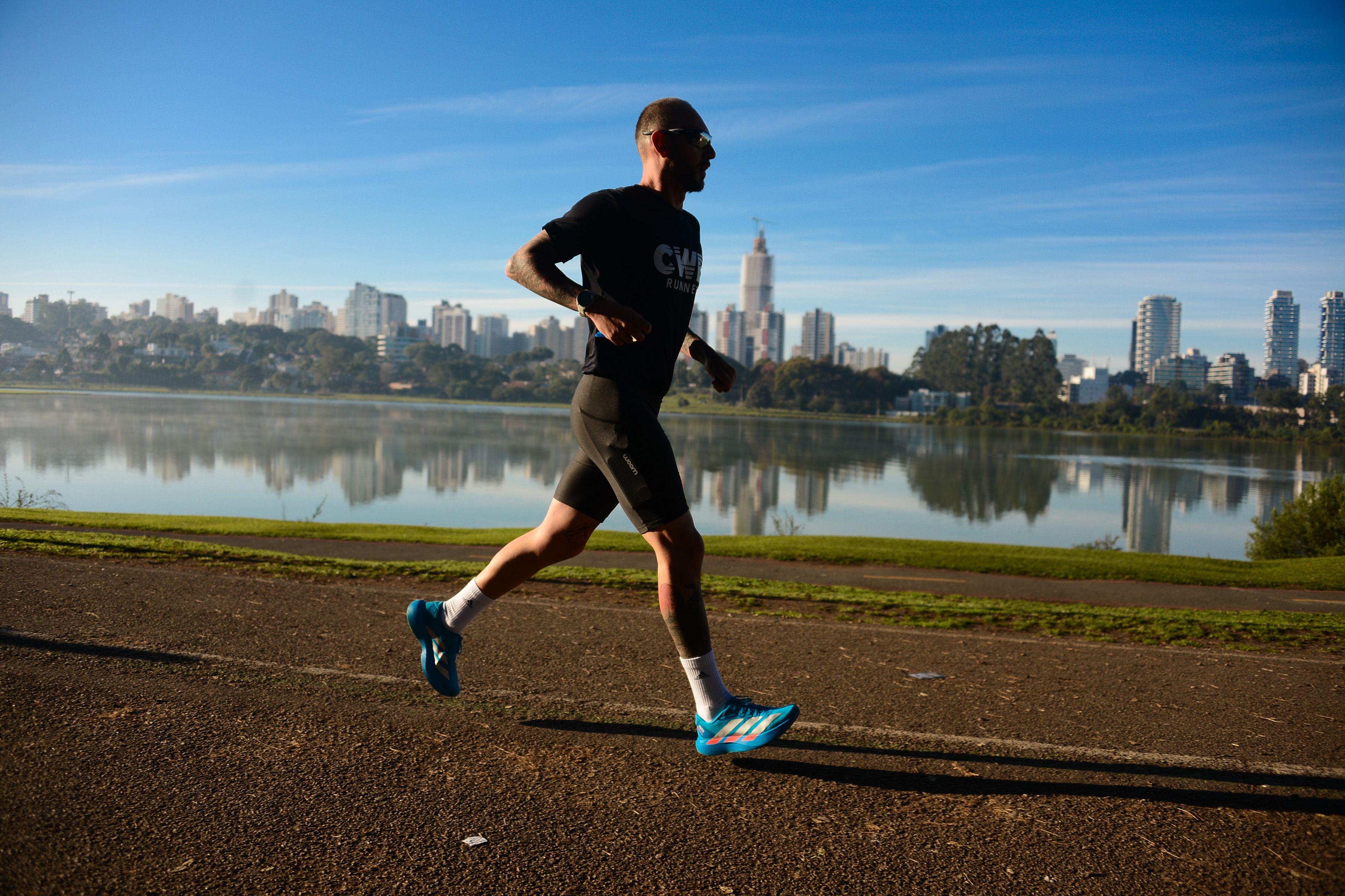 Man jogging in urban park setting