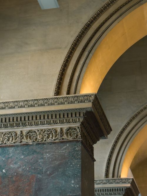 Free Intricately carved stone archway in classic architectural style, capturing elegant design and grandeur. Stock Photo