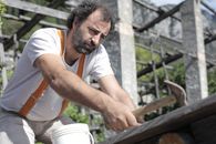 Man Using Hammer