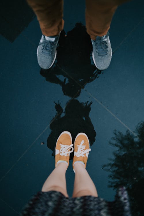 Free Person Wearing Sneakers Stock Photo