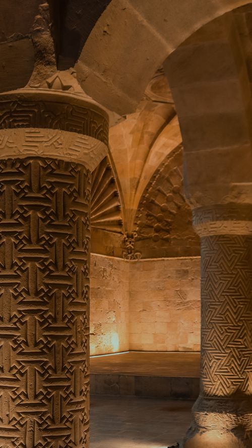 Free Intricate stone columns in a historic underground setting, showcasing ancient artistry. Stock Photo