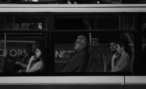Free Monochrome portrait of passengers lost in thought on a bus in Ankara, Türkiye. Stock Photo