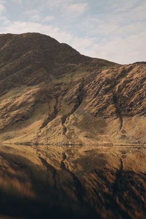 Free Captivating mountain reflection in Killarney's serene landscape. Stock Photo