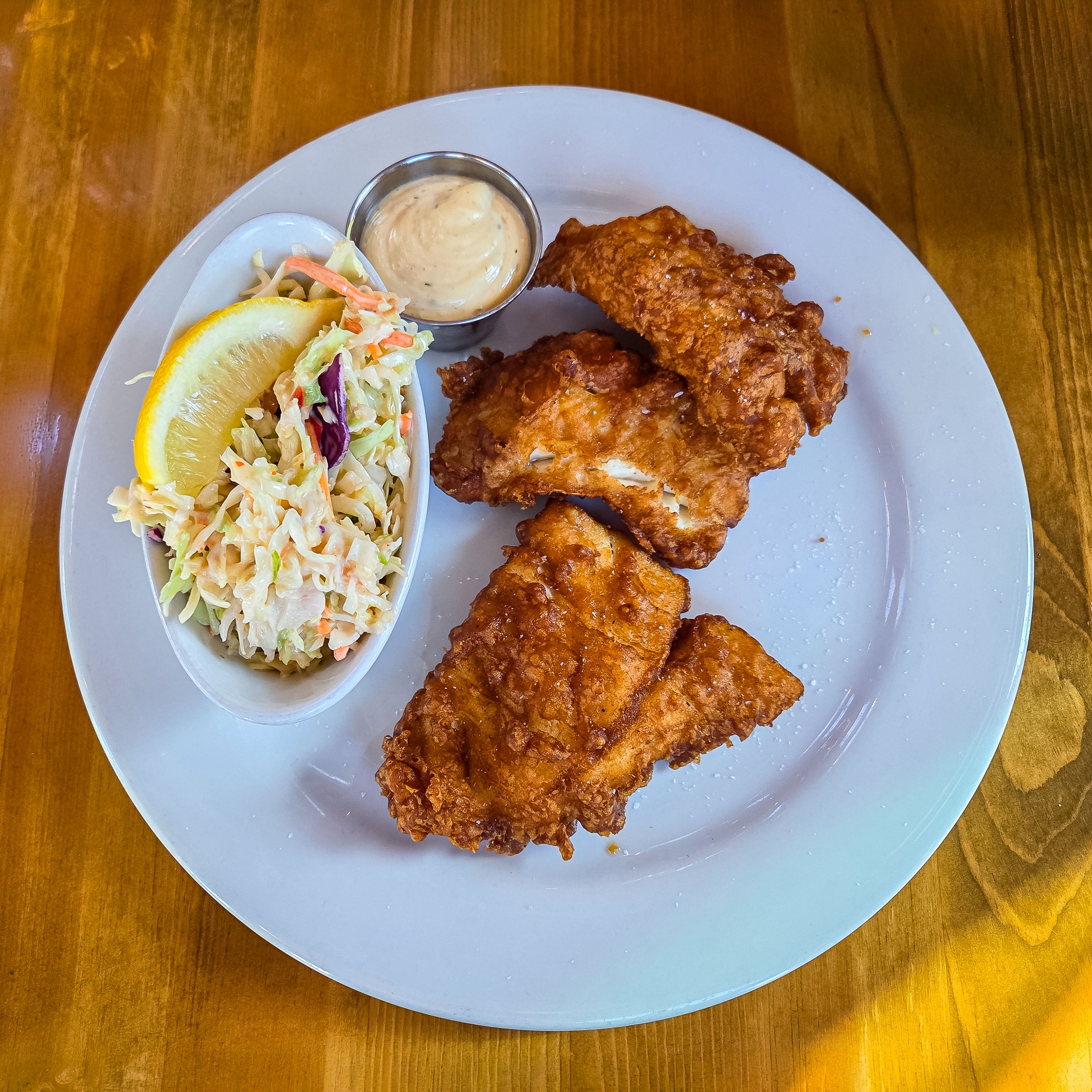 Crispy battered fish with slaw — photo by William Jacobs on Pexels
