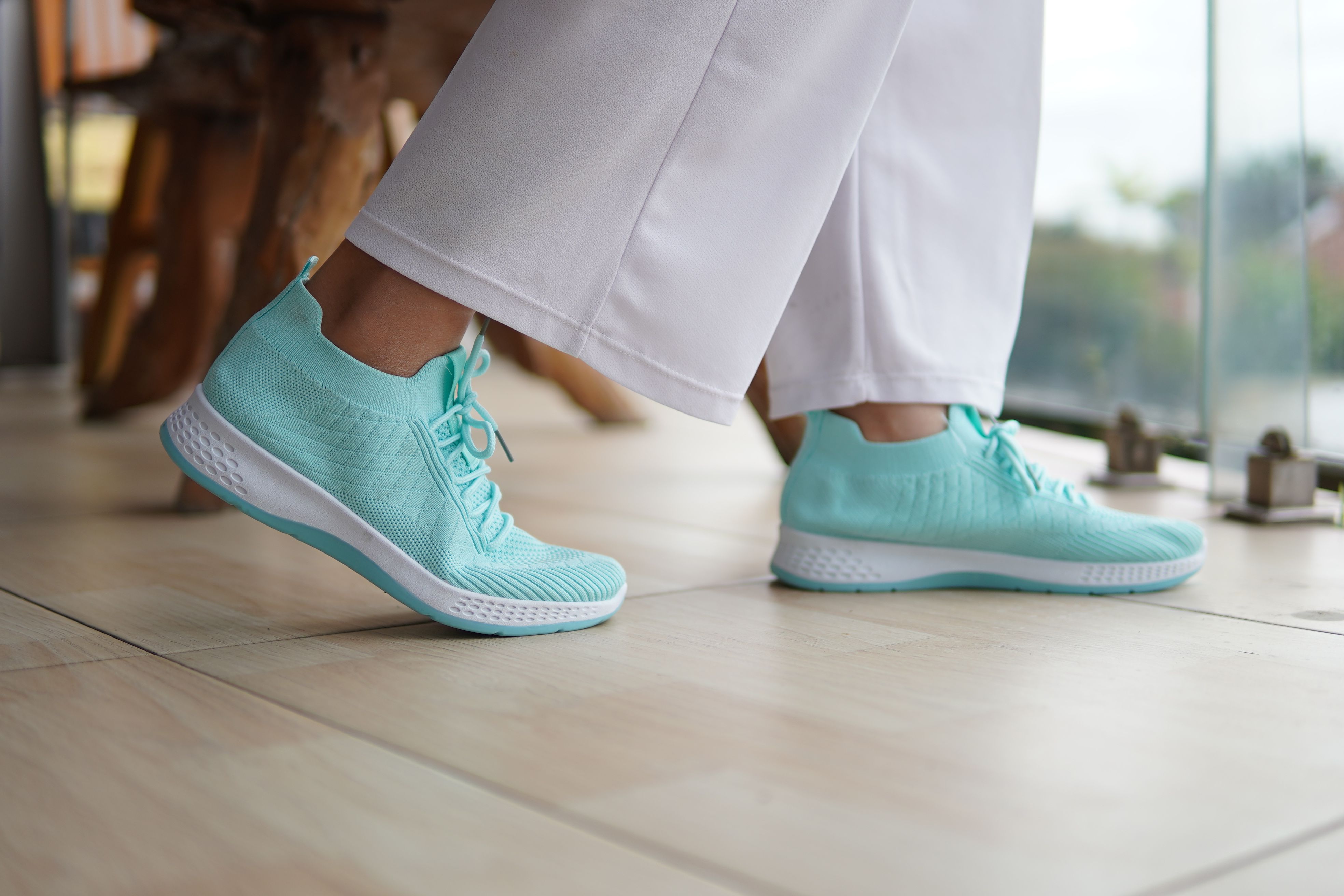 Person wearing comfortable slip-on walking shoes on a street in Kyoto, Japan