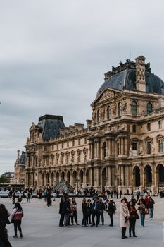 Explore the architectural grandeur of the Louvre Museum in Paris, France.