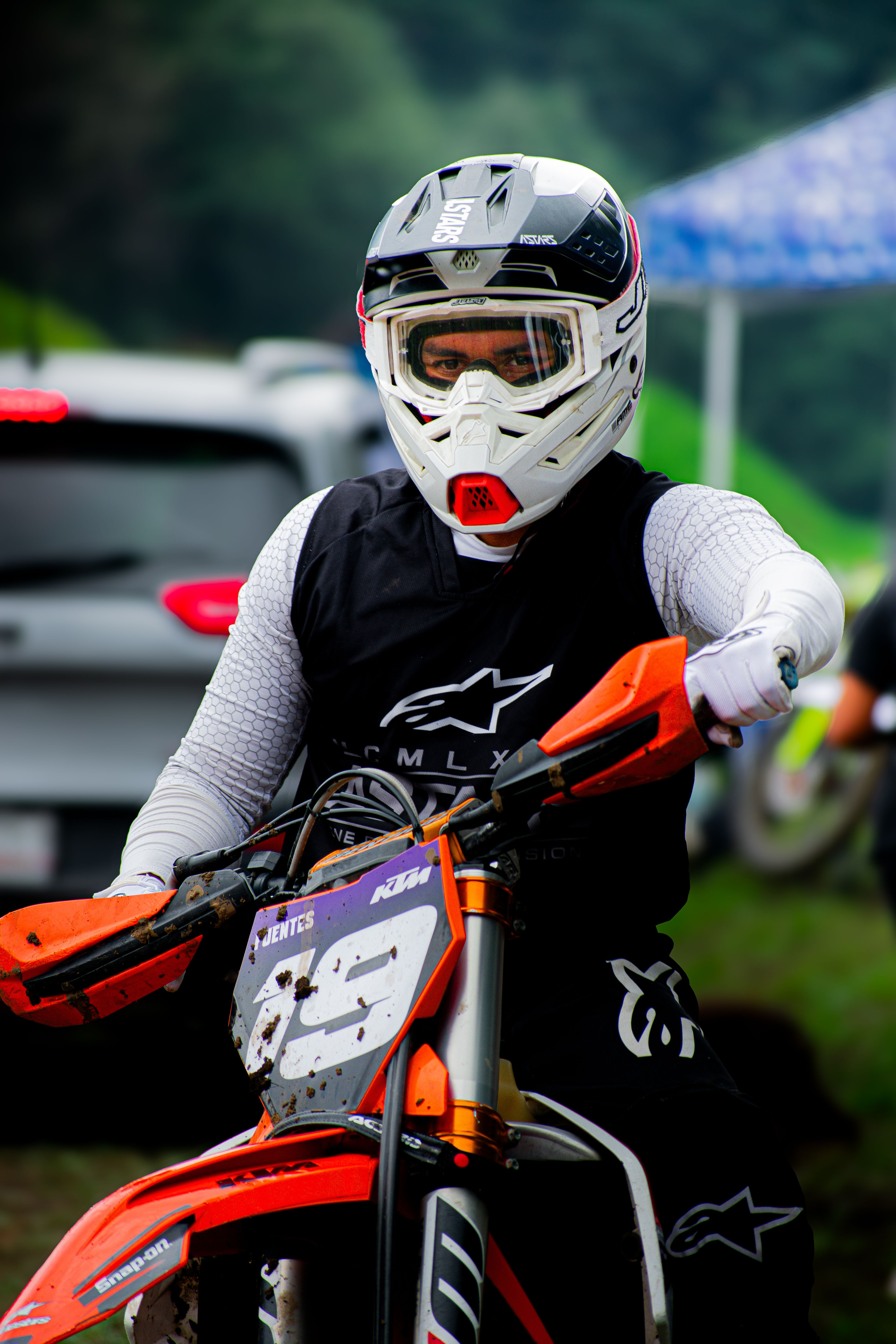 Motorcyclist at a race event in Ciudad de México, Mexico, showcasing competitive spirit and gear.