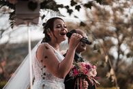 Expressive bride singing on wedding celebration