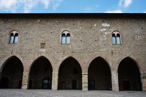 Free Historic stone building with arches in Bergamo, reflecting medieval architecture. Stock Photo