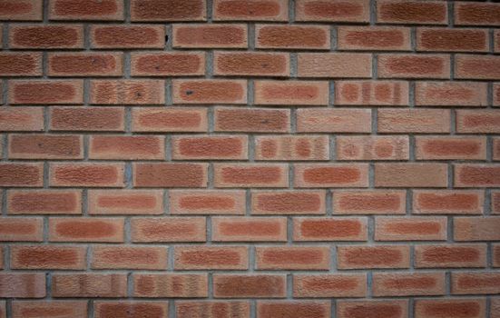 Detailed texture of red brick wall, perfect for architectural designs and backgrounds.
