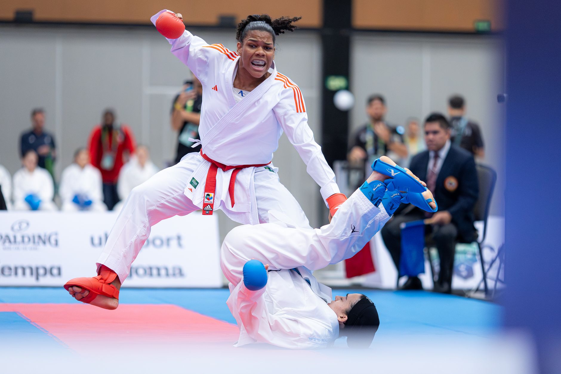 Intense karate match showcasing powerful athletic skills at a sports event in Brasil.